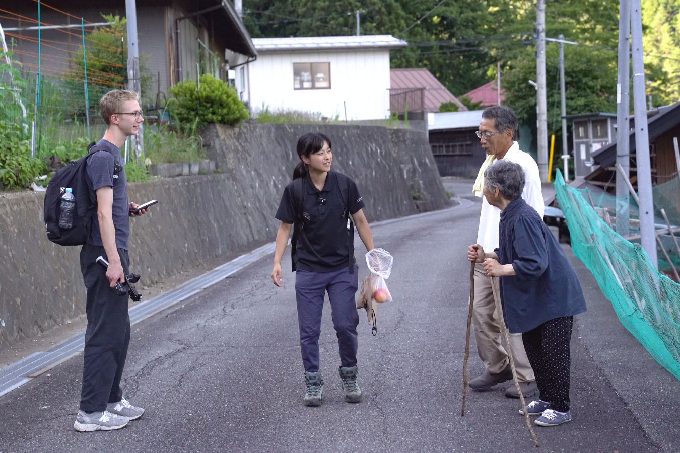 Meeting 89-year old farmer Toshiko Mochizuki (right), together with two agricultural volunteers